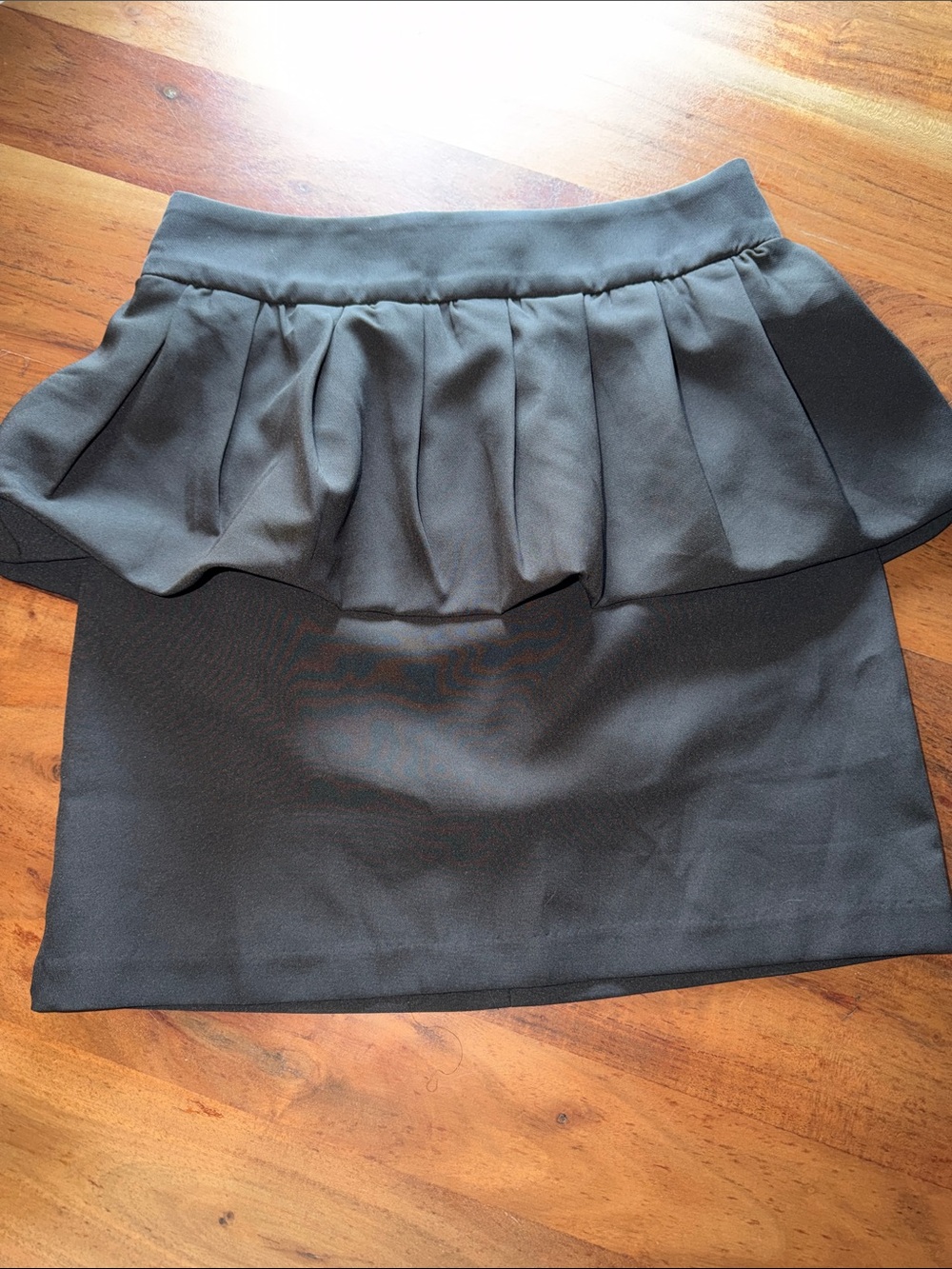 Black Peplum Mini Skirt with Pleated Waistband